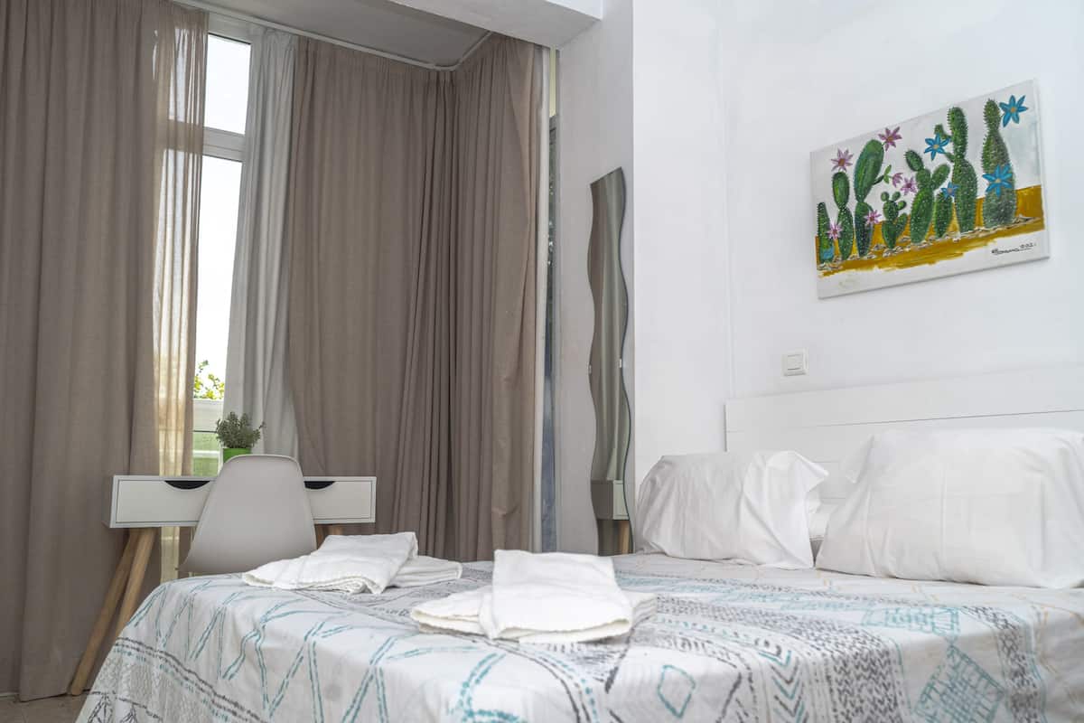 1 bedroom, down duvets, blackout curtains, iron/ironing board