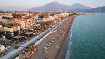 On the beach, beach cabanas, sun loungers, beach umbrellas