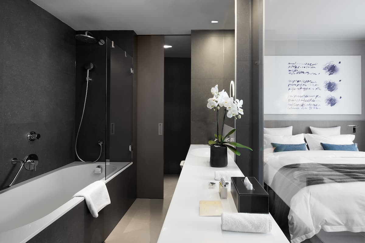 double room | bathroom | rainfall showerhead, designer toiletries, hair dryer, bathrobes