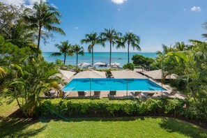 Outdoor pool, pool umbrellas, sun loungers