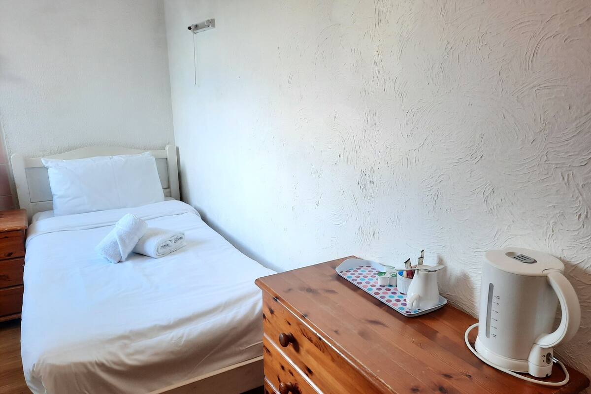 Habitación individual, baño compartido
