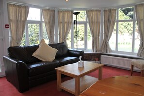 Classic Suite (Breakfast Excluded) with Sofa Bed Max 4 pax, extra charge 25£ per person | Living area | TV, DVD player - Longview Hotel (Knutsford)