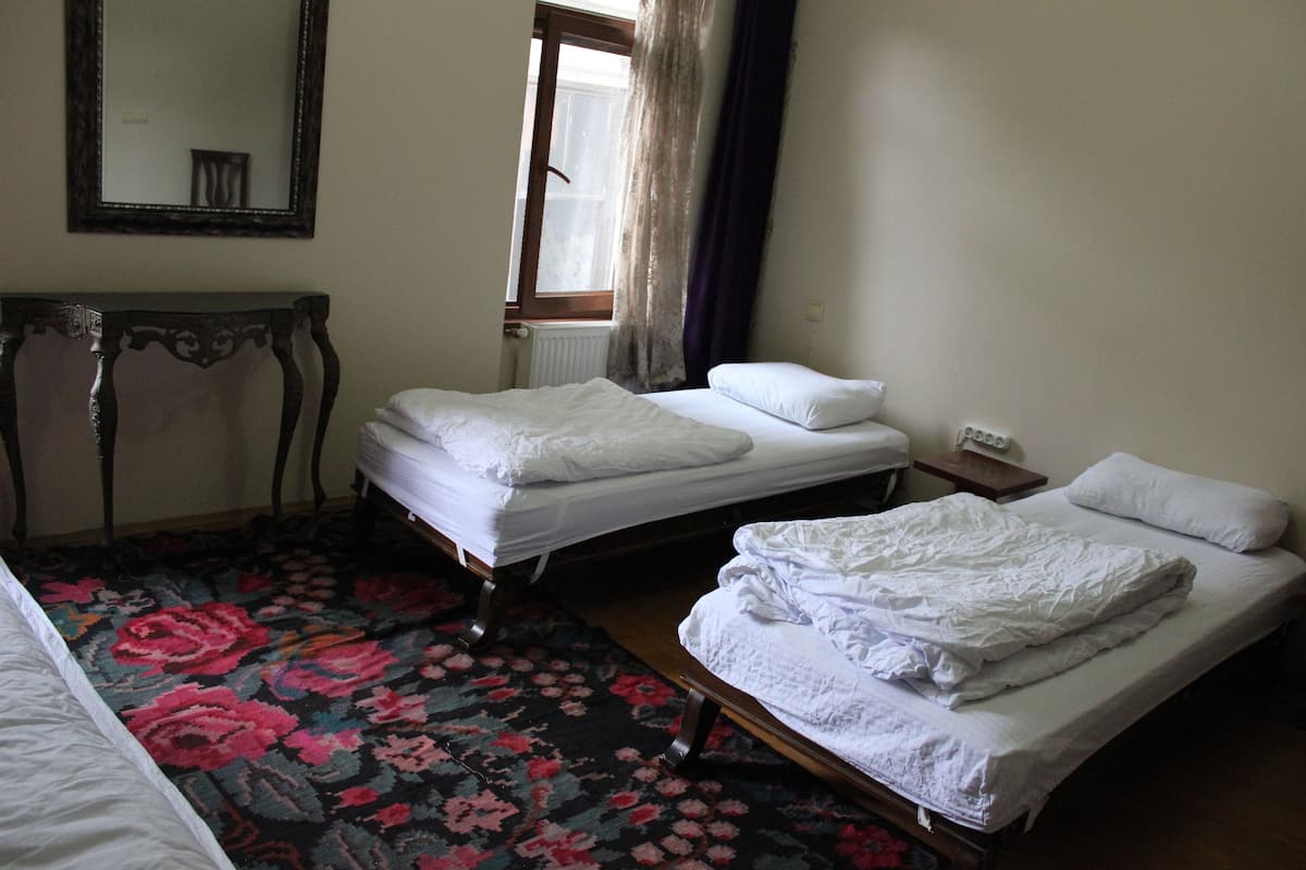Standard Triple Room, 3 Twin Beds, Shared Bathroom | In-room safe, WiFi (free), bed sheets