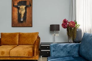 Standard Apartment, 2 Bedrooms | Living area | 32-inch flat-screen TV with cable channels, TV
