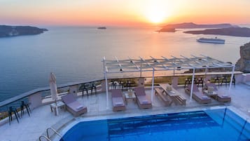 Outdoor pool, pool umbrellas, pool loungers