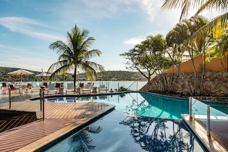 Outdoor pool, pool umbrellas, sun loungers