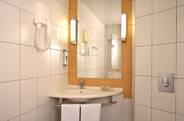Shower, eco-friendly toiletries, hair dryer, slippers