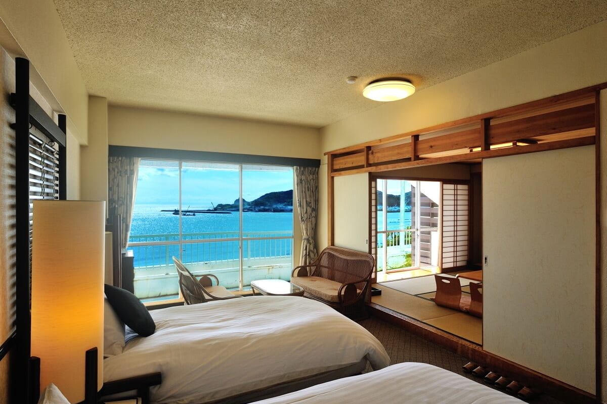 deluxe room with tatami area and ocean view | 1 bedroom, in-room safe, blackout curtains, iron/ironing board