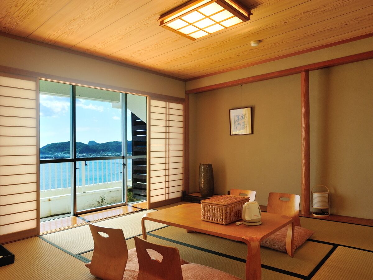 deluxe room with tatami area and ocean view | 1 bedroom, in-room safe, blackout curtains, iron/ironing board