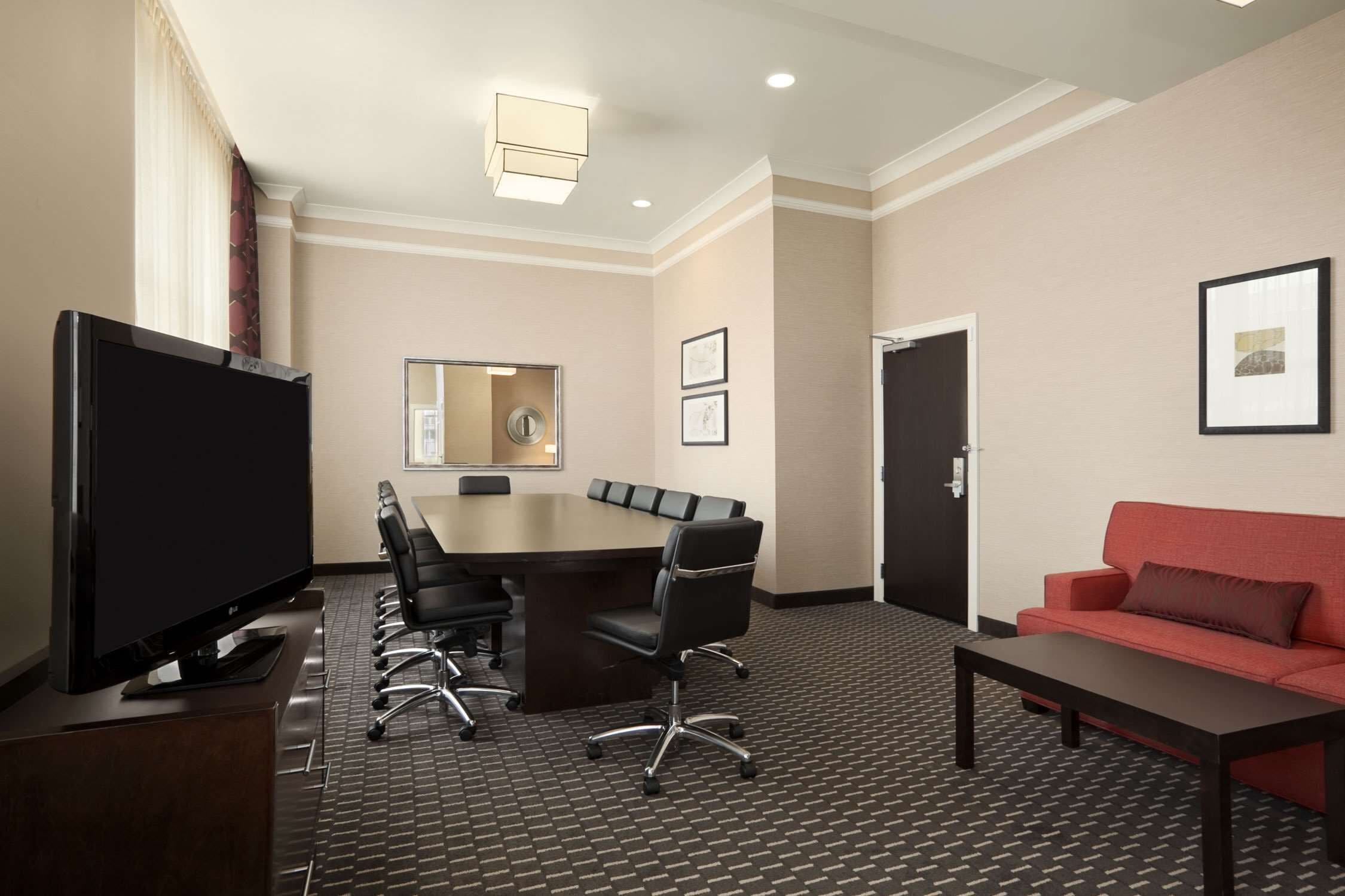 executive suite, 1 king bed with sofa bed, non smoking (conference) | living area | 50-inch flat-screen tv with cable channels, tv, netflix