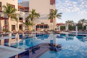 Outdoor pool, pool umbrellas, pool loungers