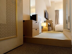 Desk, blackout drapes, iron/ironing board, free WiFi