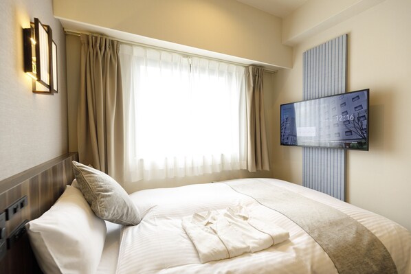 Desk, blackout curtains, iron/ironing board, free WiFi