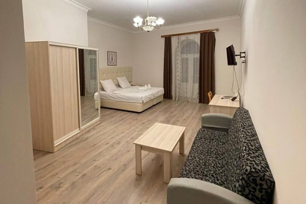 Deluxe Room, 1 Double or 2 Single Beds | 1 bedroom, pillow-top beds, minibar, desk
