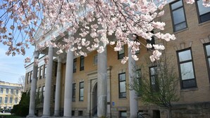 A building with classical architecture, featuring columns and a symmetrical facade. - Hampton Inn & Suites Charles Town (Charles Town)