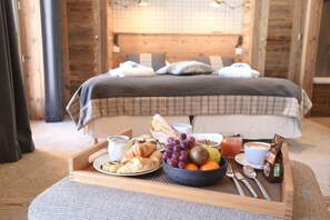 Suite junior | Ropa de cama de alta calidad y minibar