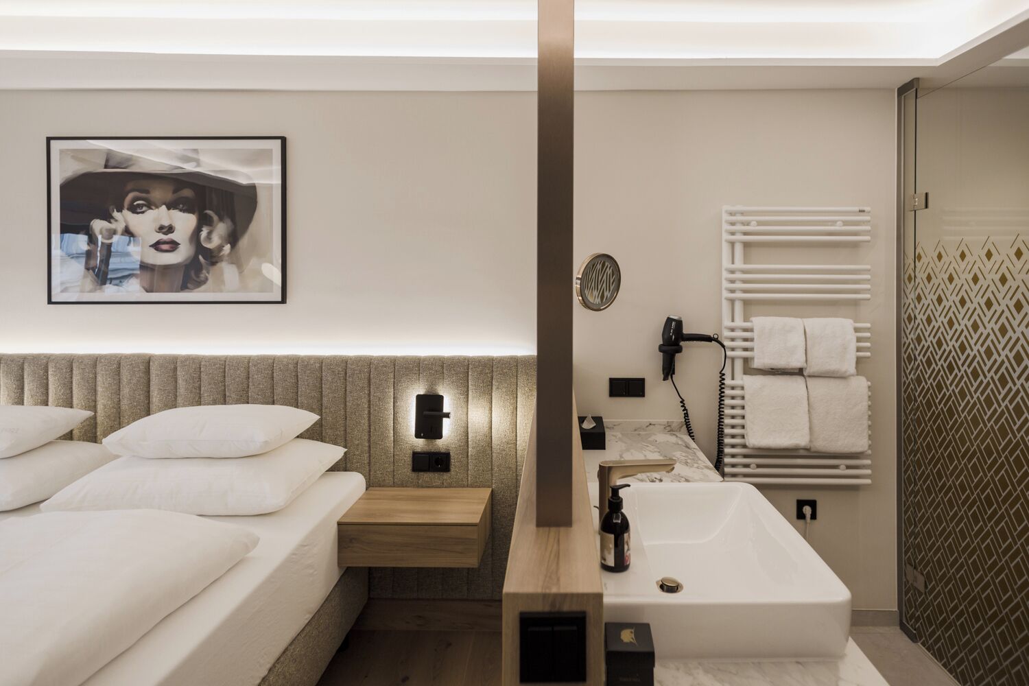 deluxe room | bathroom | hair dryer, towels, soap, shampoo