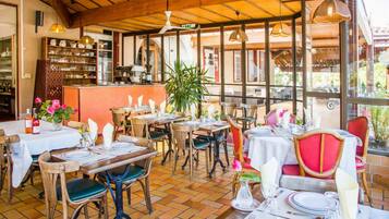 Breakfast, lunch, dinner served; French cuisine, garden views