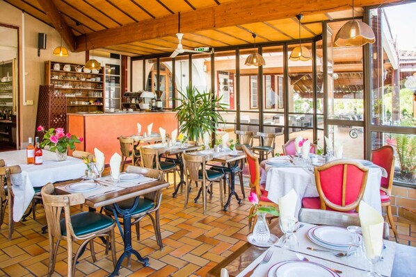 Breakfast, lunch, dinner served; French cuisine, garden views