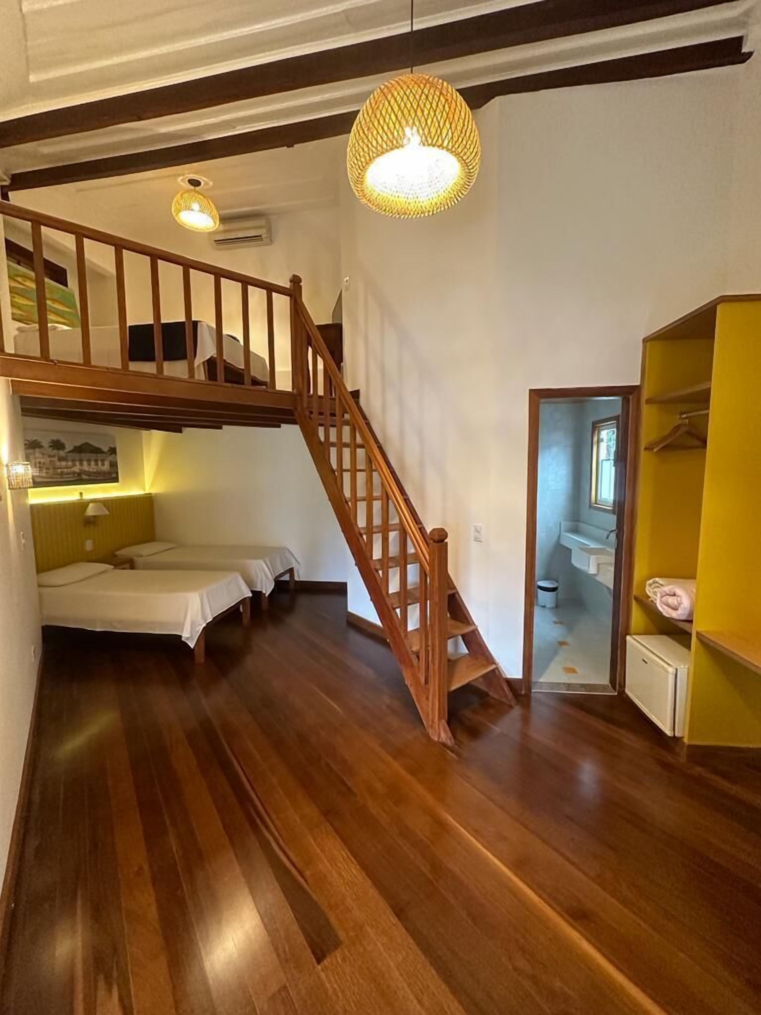 Deluxe-værelse til 4 personer - mezzanin | Minibar, gratis Wi-Fi