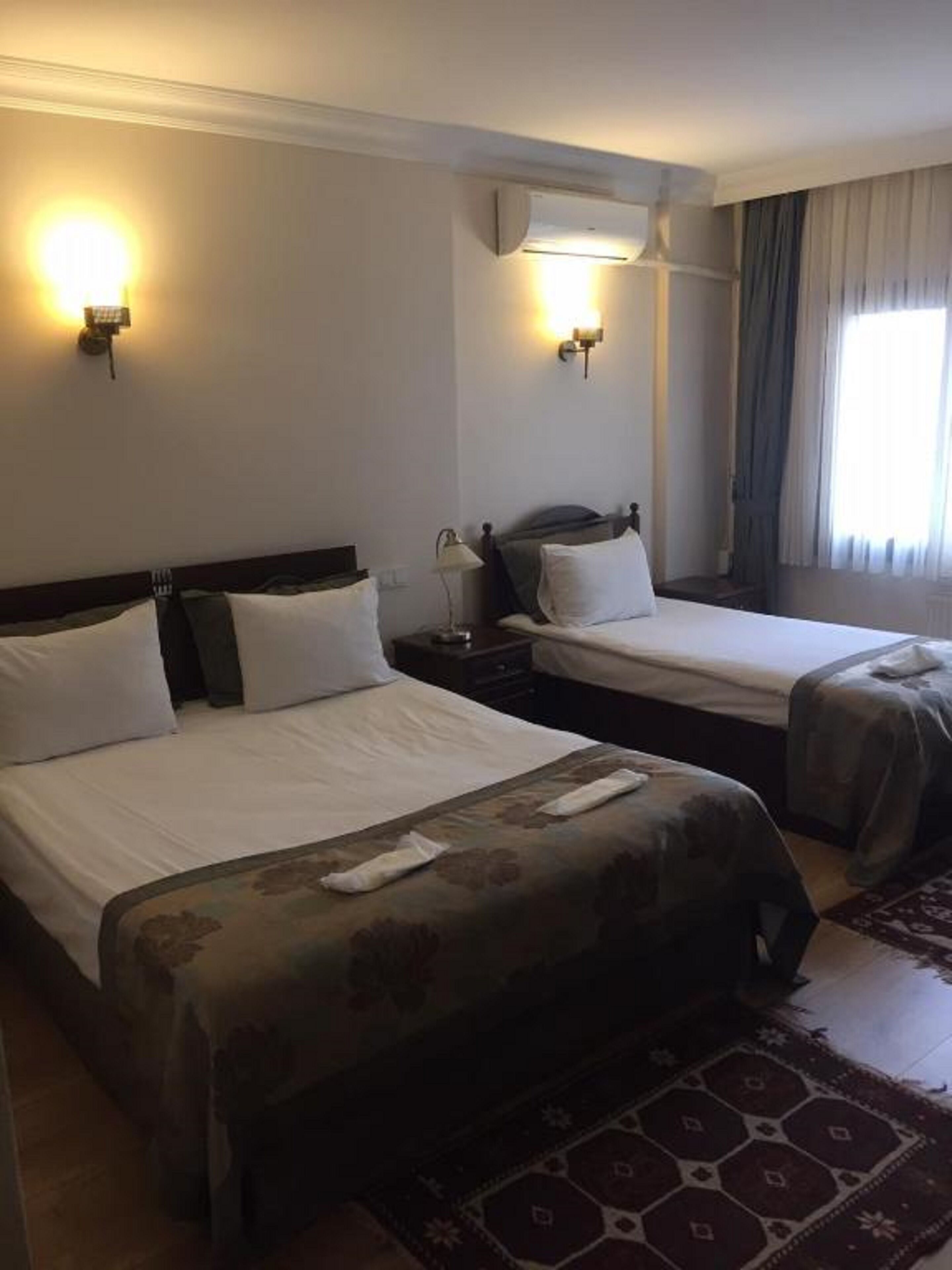 deluxe triple room | minibar, laptop workspace, iron/ironing board, free wifi