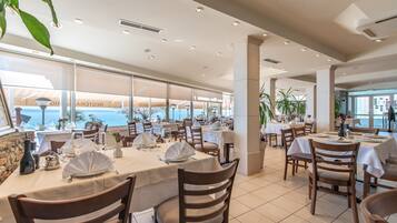 Breakfast, lunch, dinner served; beach views