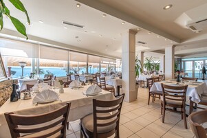 Breakfast, lunch, dinner served; beach views