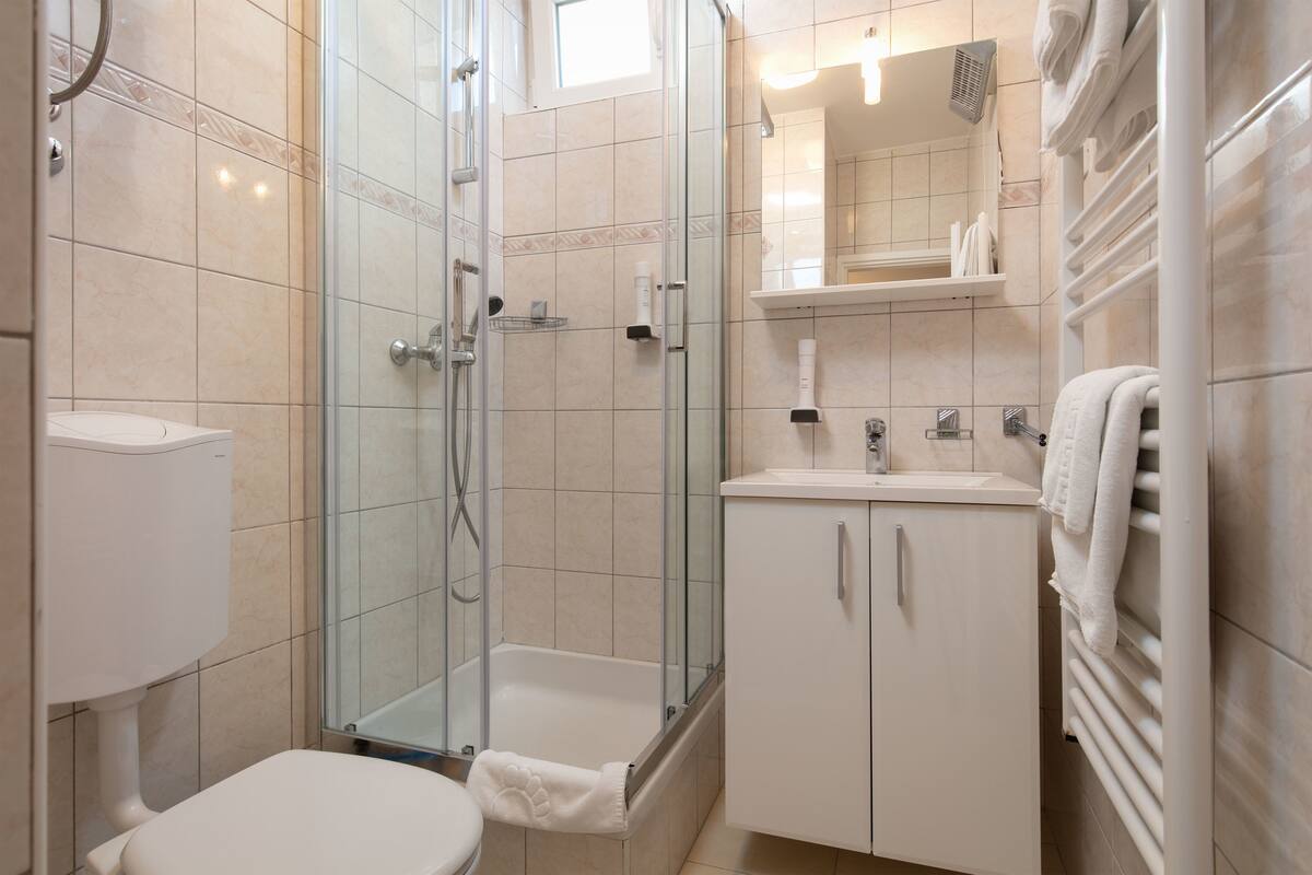 quadruple room, sea view | bathroom | free toiletries, hair dryer, towels