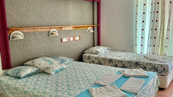 Standard Triple Room | Pillowtop beds, in-room safe, desk, laptop workspace