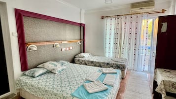 Family Studio, 2 Bedrooms | Pillowtop beds, in-room safe, desk, laptop workspace