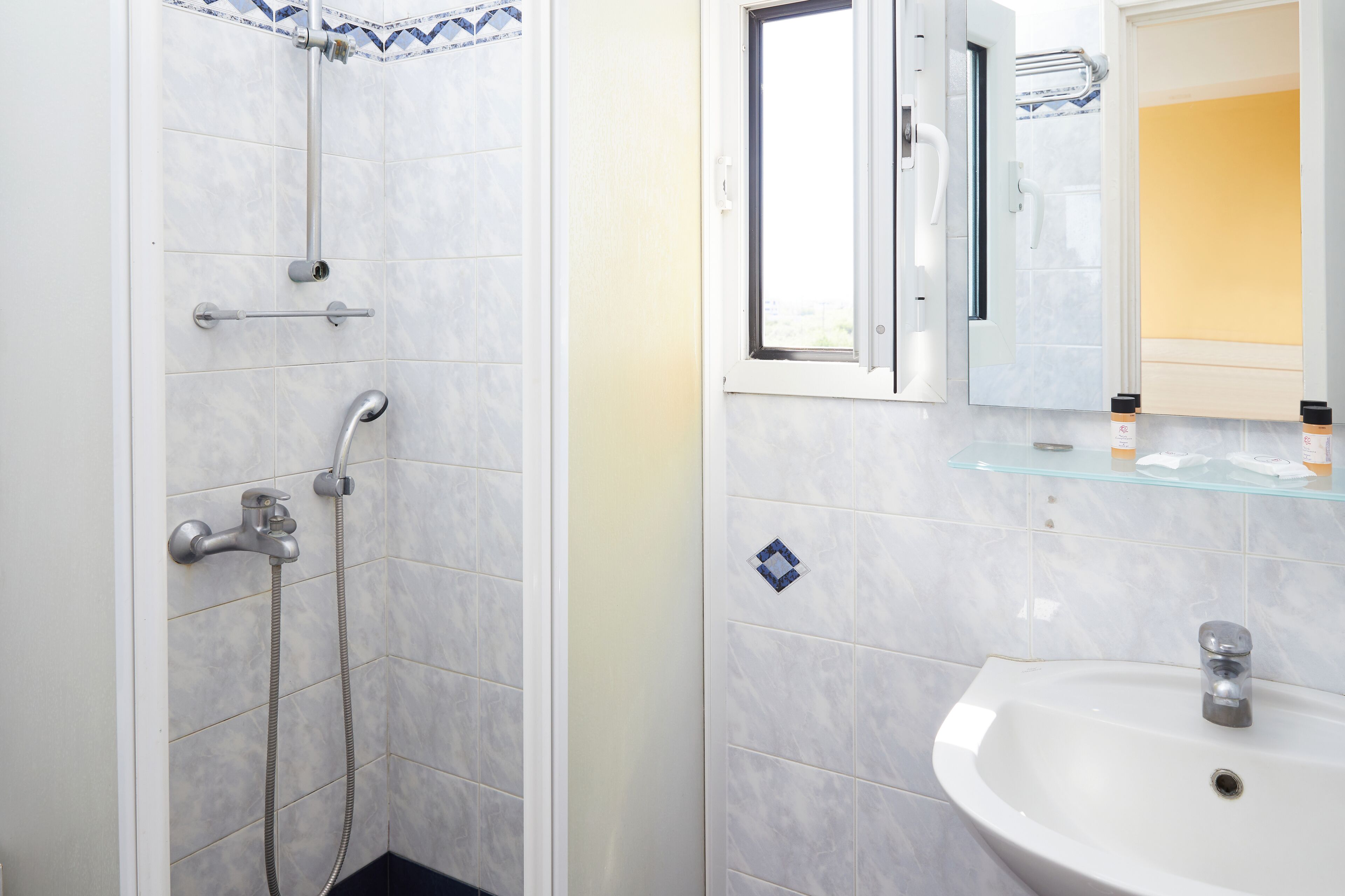 triple room | bathroom | hair dryer, towels