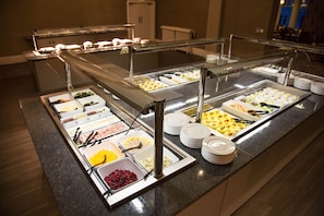 A buffet with various food items and utensils. - Cliffs Hotel - Blackpool (Blackpool)