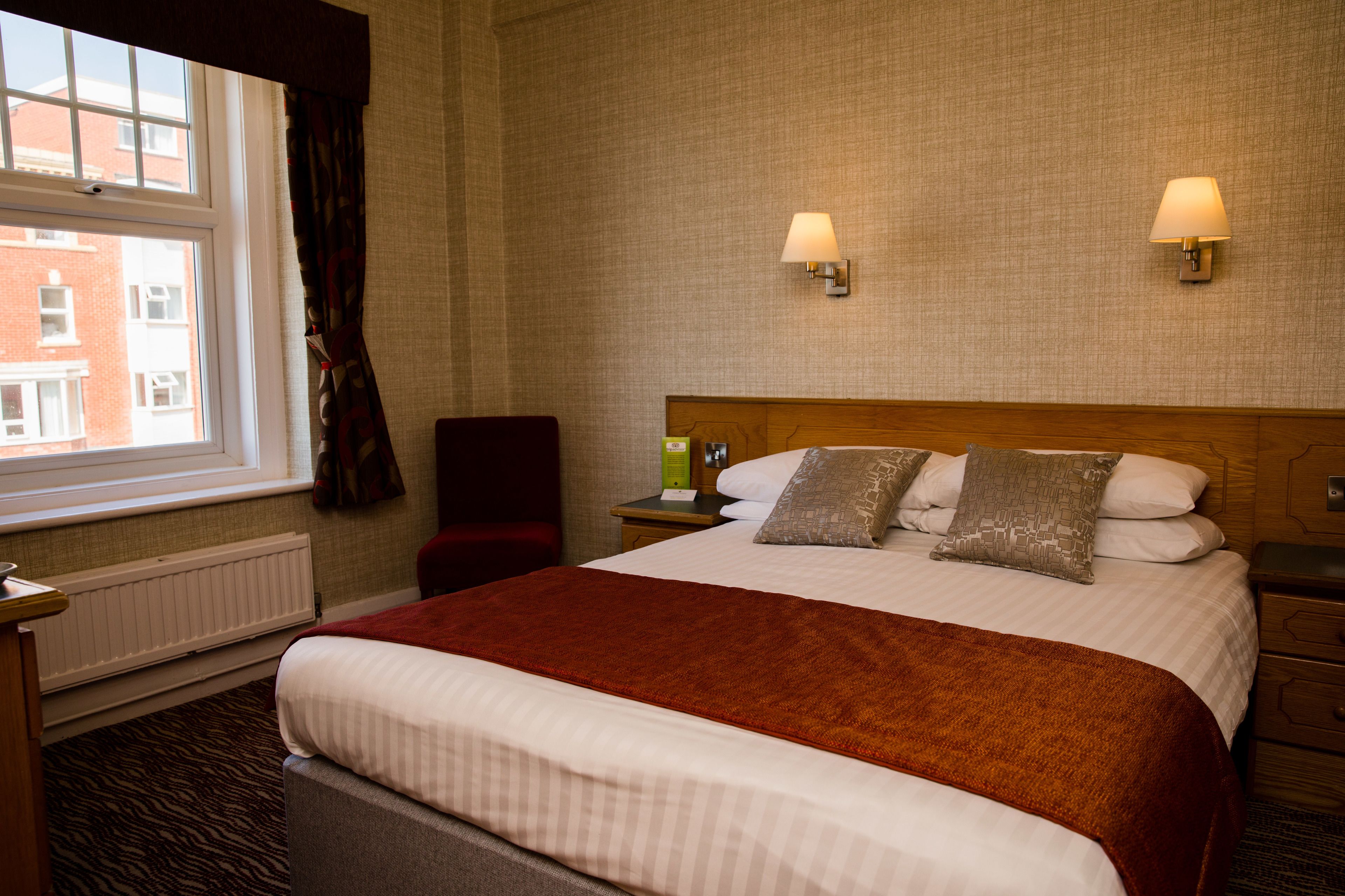 double room, partial sea view | blackout curtains, iron/ironing board, bed sheets