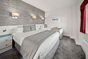 Blackout curtains, iron/ironing board, bed sheets