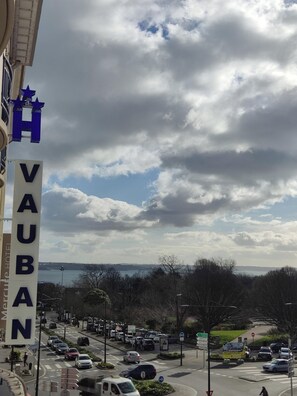A hotel sign with 'VAUBAN' written vertically. - Hôtel Vauban (Brest)