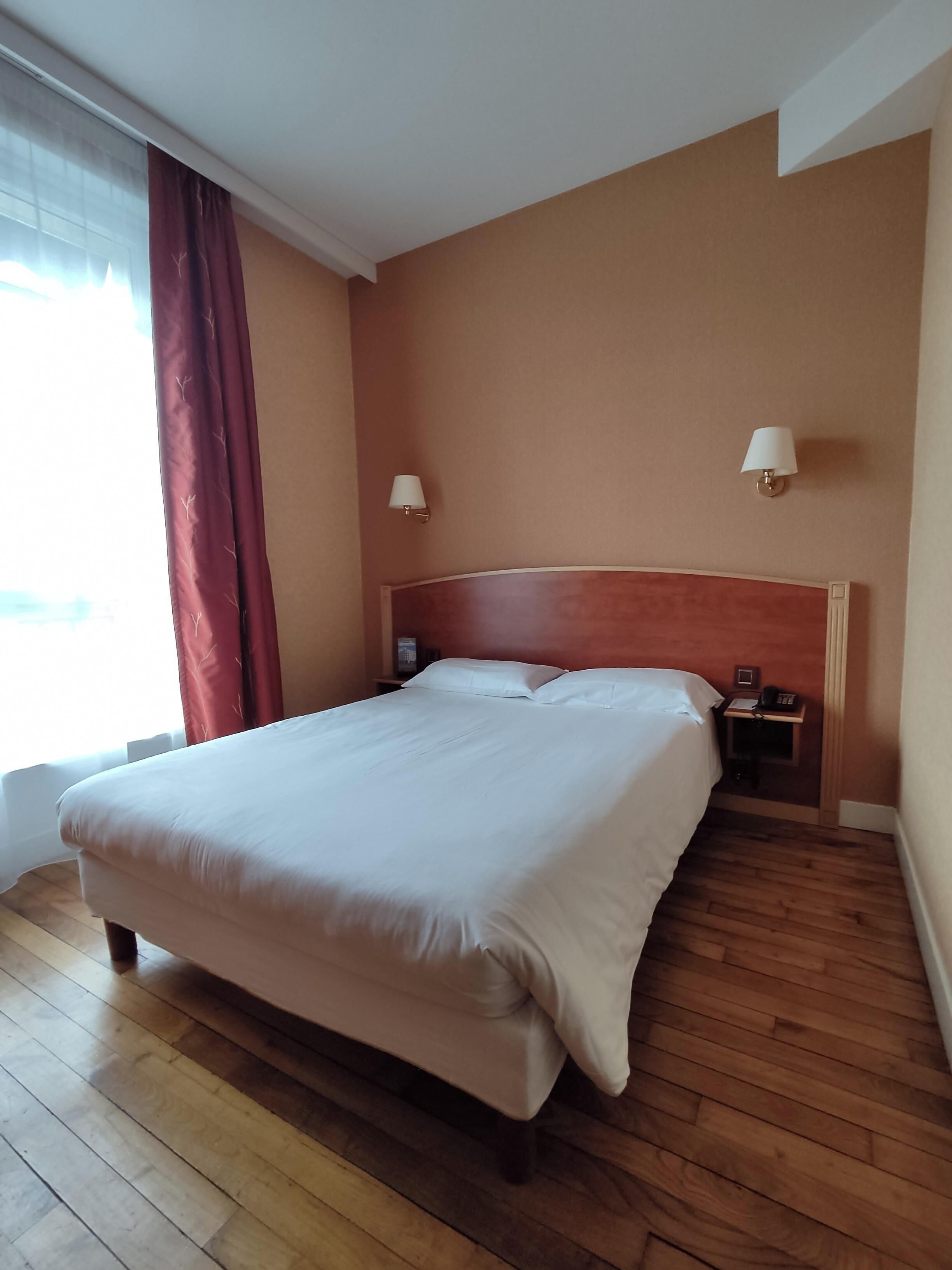 premium bedding, desk, laptop workspace, blackout curtains