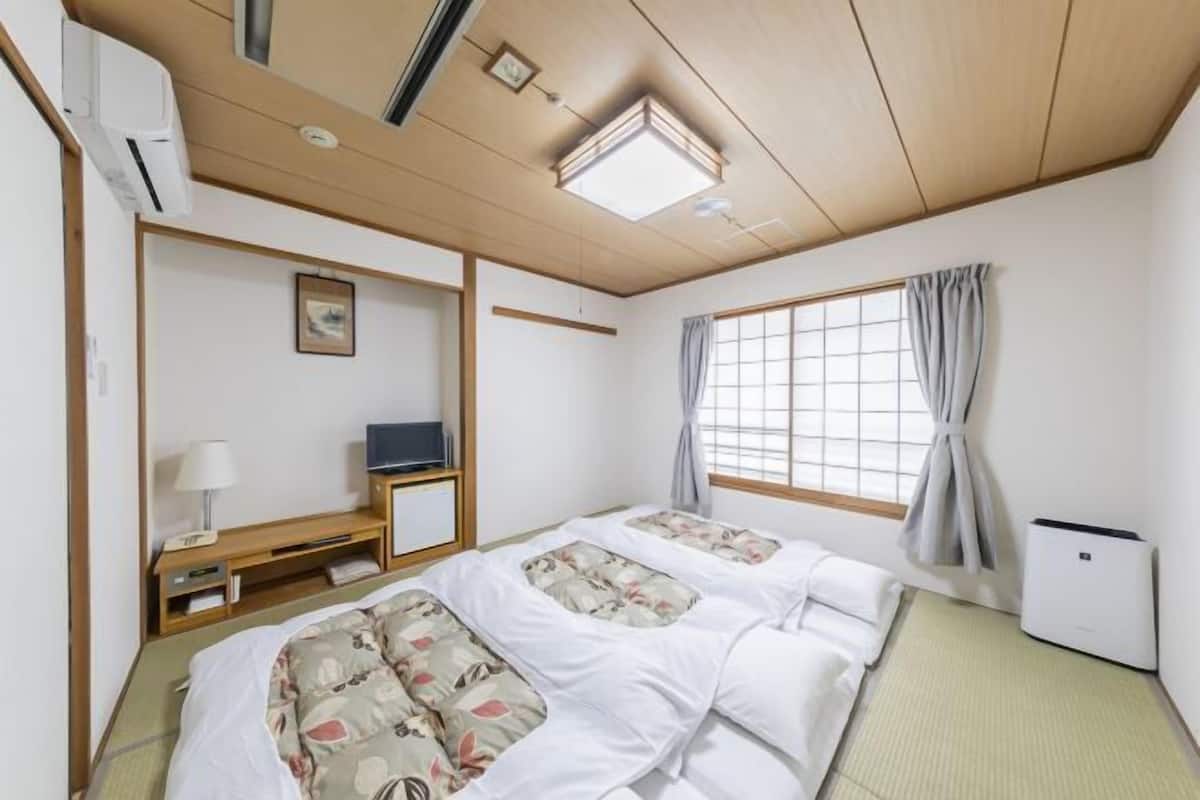 Premium bedding, desk, blackout curtains, soundproofing