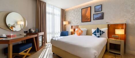 Standard Room, 1 Queen Bed, City View | Minibar, in-room safe, desk, laptop workspace