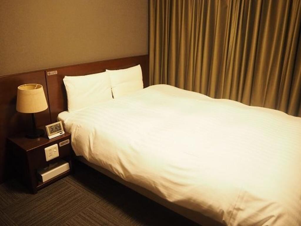 Desk, blackout curtains, free WiFi, bed sheets