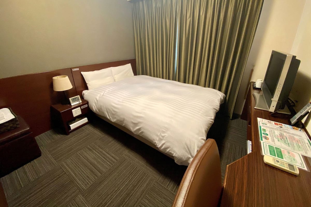 Desk, blackout curtains, free WiFi, bed sheets