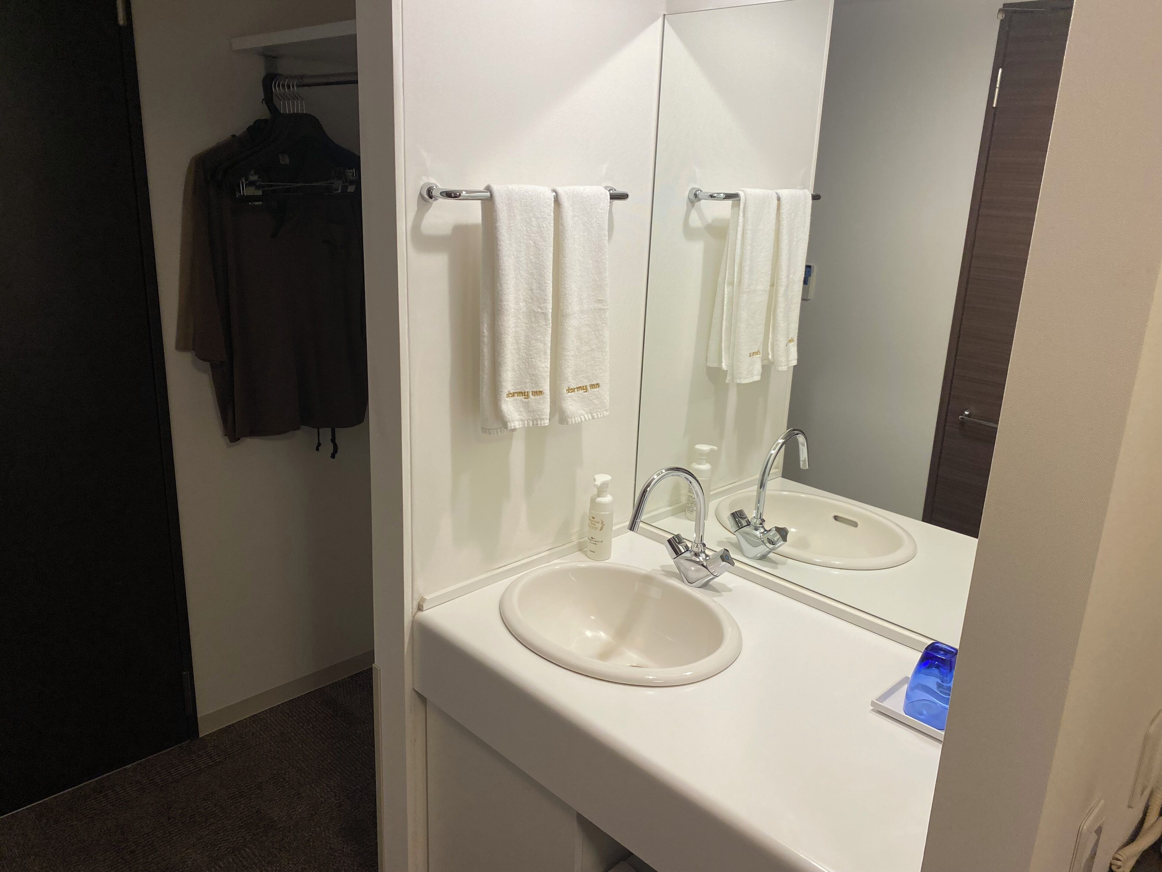 hair dryer, slippers, electronic bidet, towels