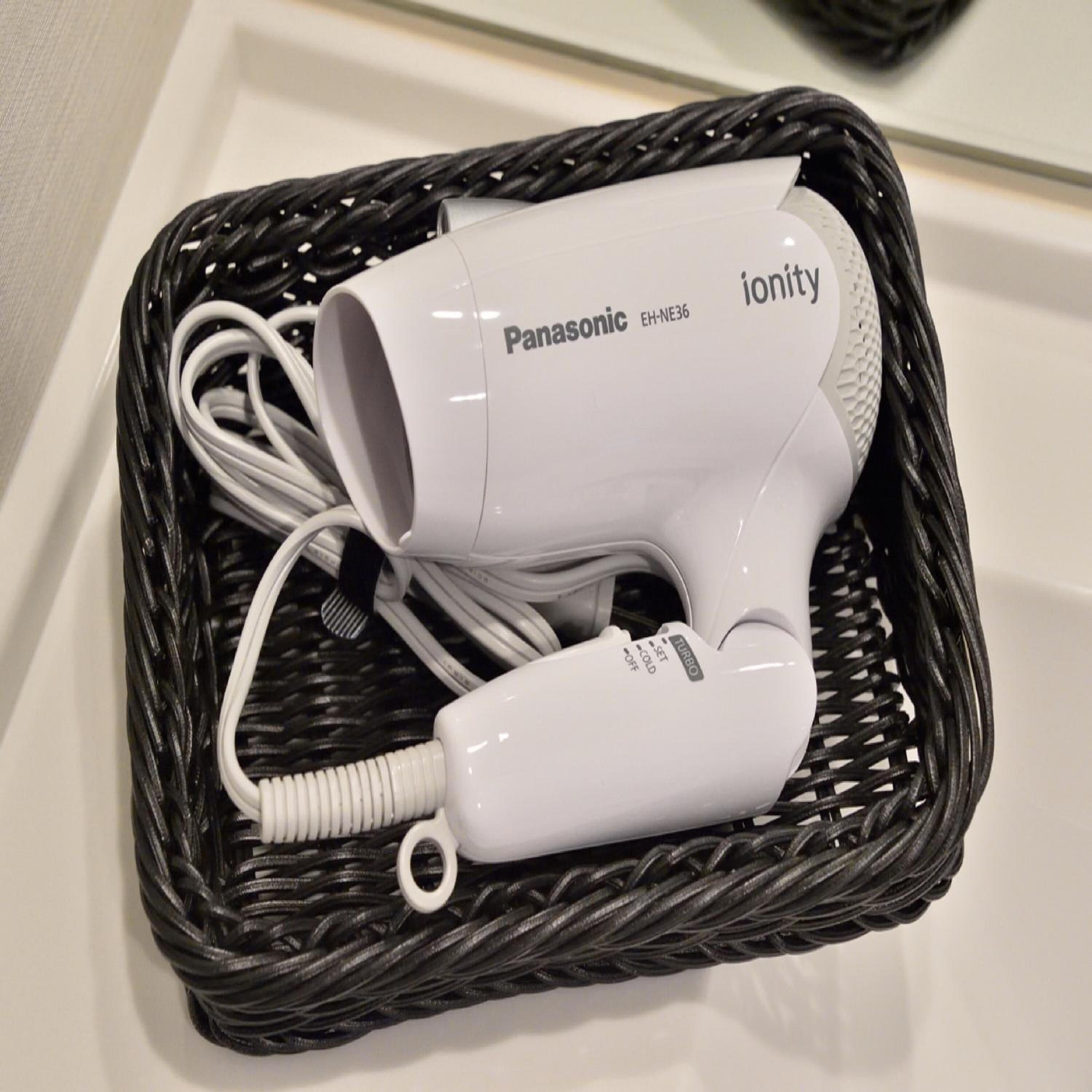 shower, hair dryer, bathrobes, slippers