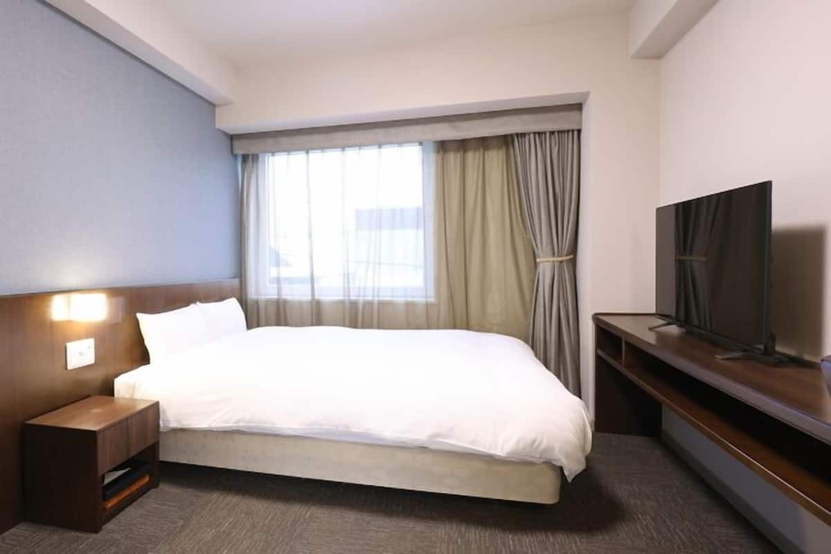 Premium bedding, down comforters, blackout drapes, WiFi (free)