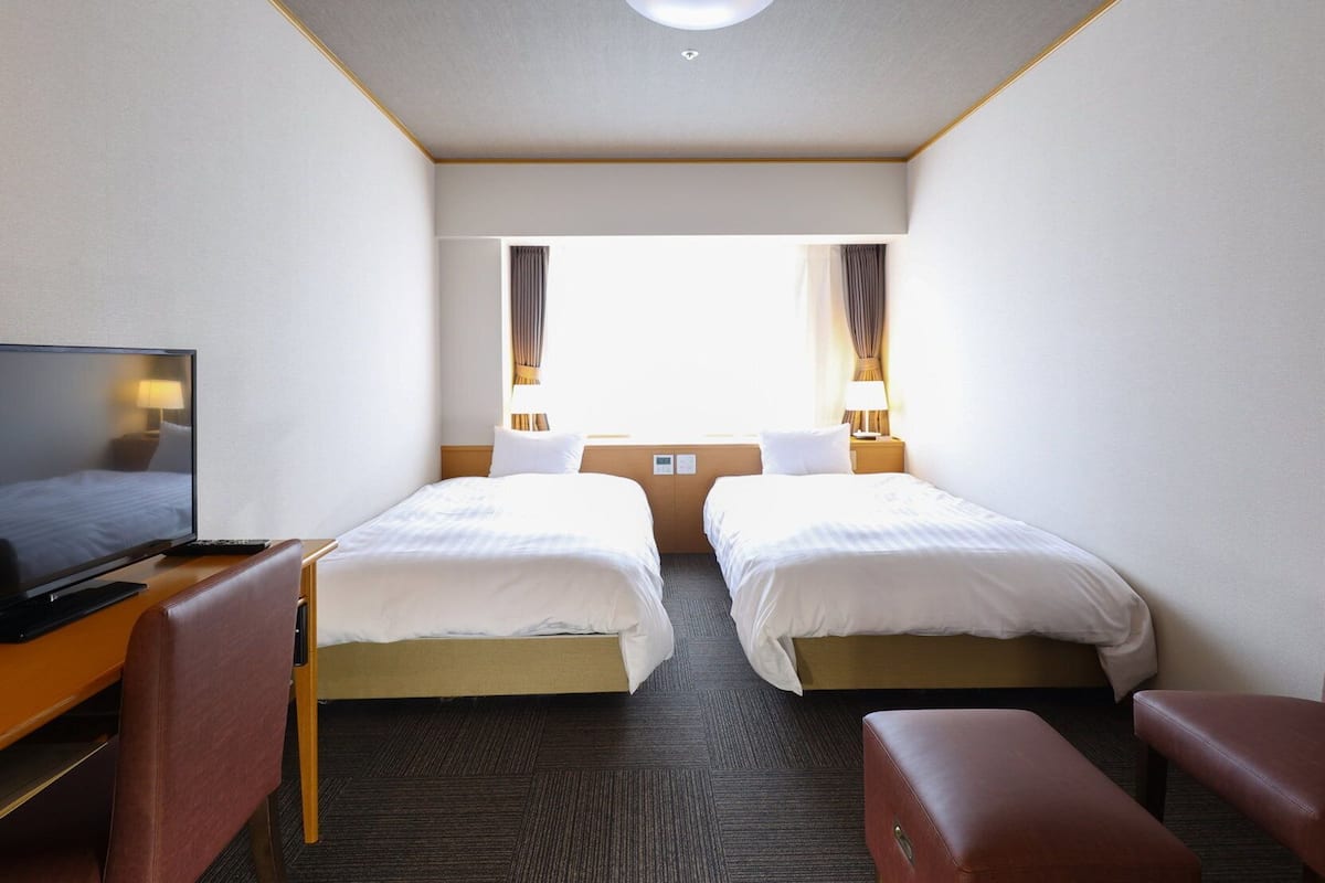 Premium bedding, down comforters, soundproofing, free WiFi