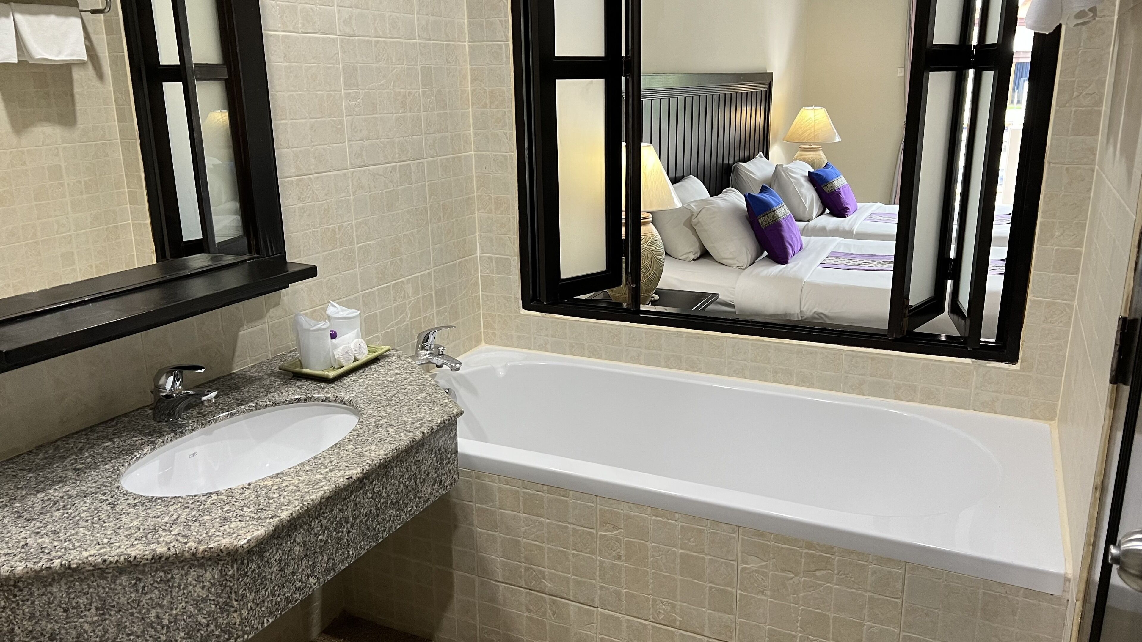 separate bathtub and shower, hydromassage showerhead, hair dryer, towels