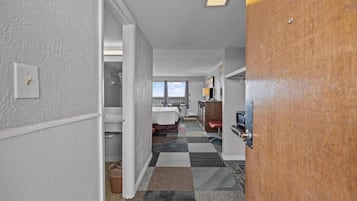 Basic Single Room, 1 King Bed | In-room safe, individually furnished, laptop workspace