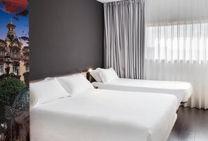 A hotel room with two beds, a large window with curtains, and a view of a building with a dome. - B&B Hotel Albacete  (Albacete)