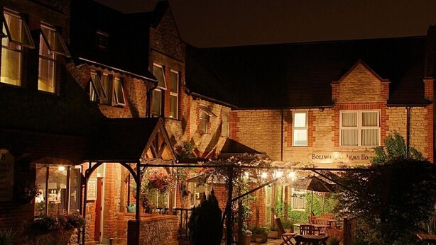A traditional brick building with a sign reading "Bolingbroke Arms Hotel." - The Bolingbroke Hotel (Swindon)
