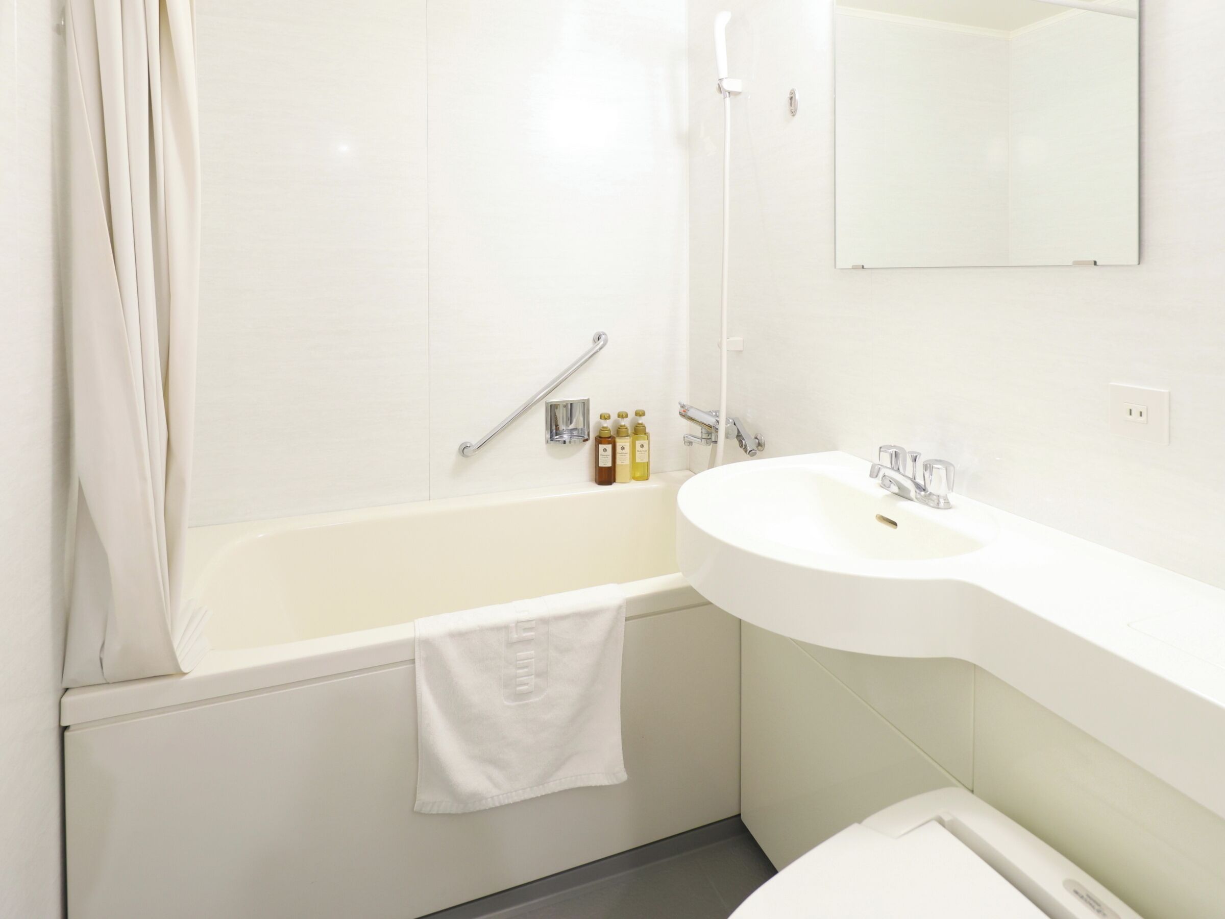 shower, rainfall showerhead, hair dryer, slippers