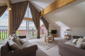 8 Berth Superior Wooden Lodge with Hot Tub | Living area | TV - Retallack Resort (St. Columb Major)